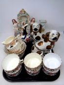 A tray containing antique ceramics to include ten pieces of 19th century tea ware,