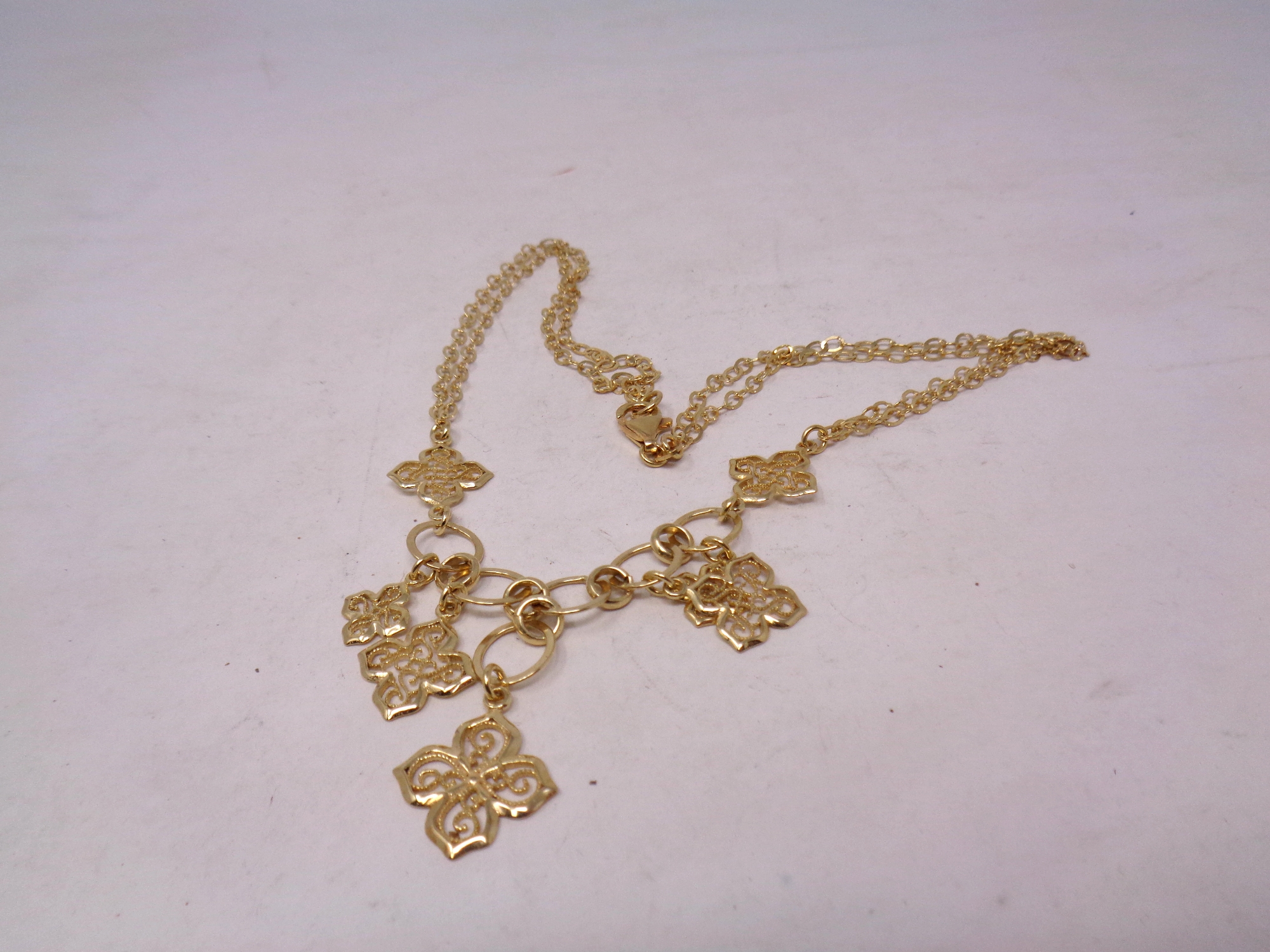 A gold plated on silver fancy necklace
