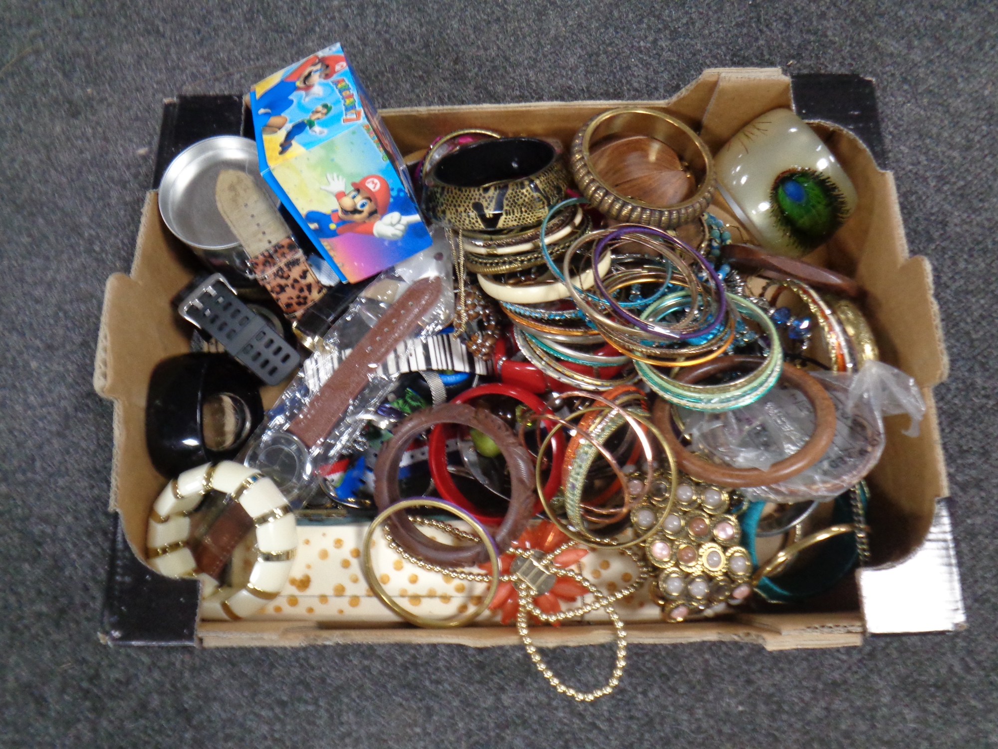 A box containing a large quantity of assorted wristwatches and bangles