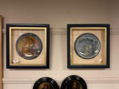 A pair of cabinet plates in display case frames depicting religious subjects (2)