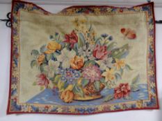 A French floral wall tapestry on wrought metal bracket