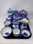 A tray containing 19th century and later blue and white wares to include Copeland Spode twin