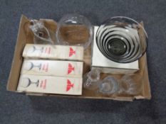 A box containing assorted boxed and unboxed glassware to include Ravenhead wine glasses,