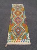 A Choli kilim runner, 200cm by 62cm.