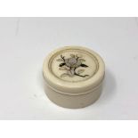 A fine Japanese circular inlaid ivory dressing table pot, diameter 3 cm.