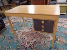 A 20th century Scandinavian single pedestal desk fitted three drawers