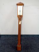 An antique stick barometer