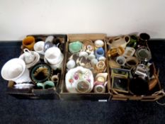 Three boxes containing miscellaneous ceramics to include plant pots, vases, a gilt Bavarian tea set,