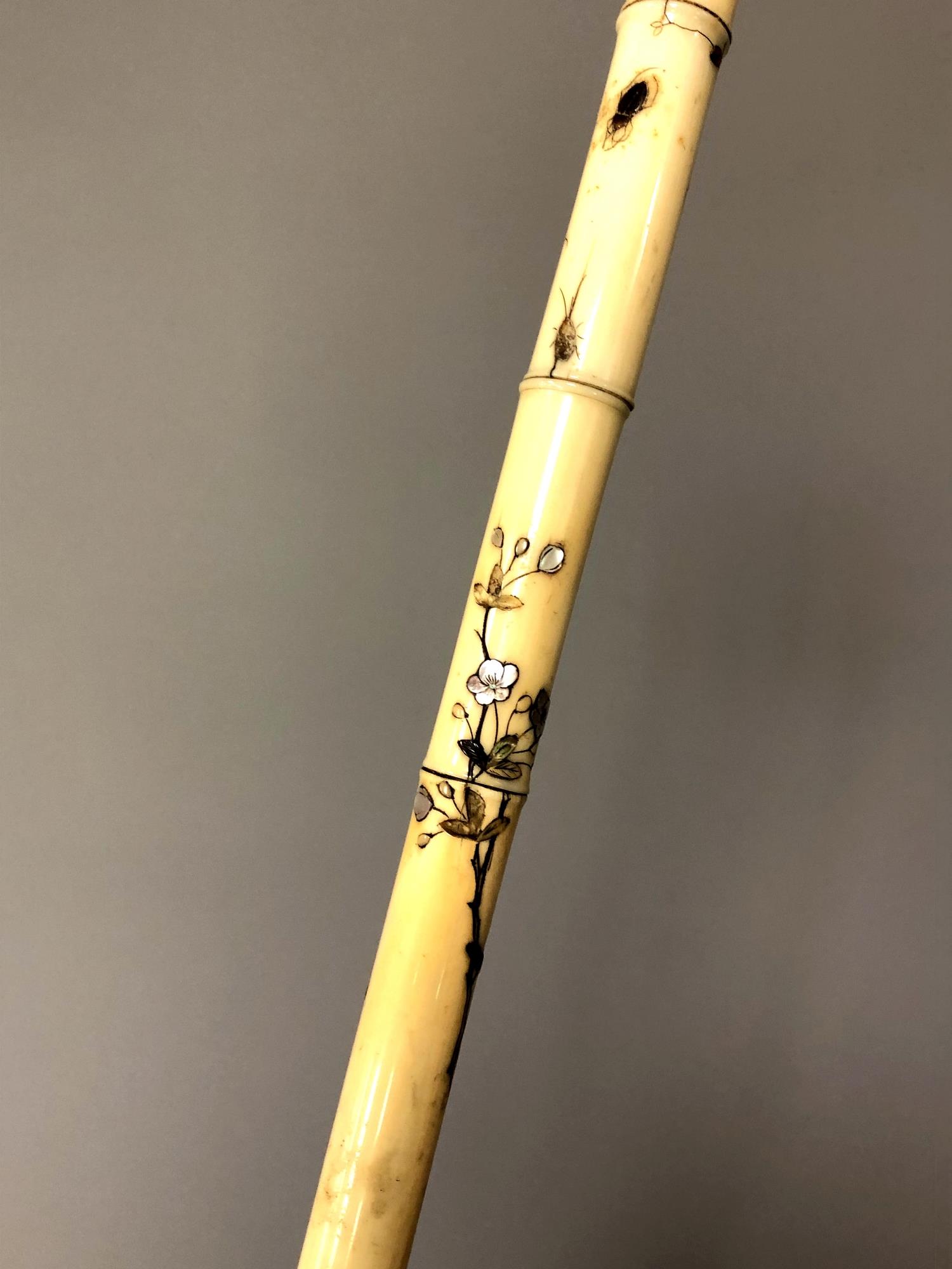 A late 19th century parasol with ivory inlaid stem decorated with vines and beetles, - Image 2 of 5