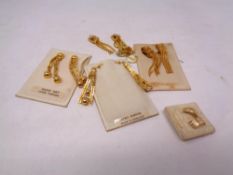 Six pairs of gold plated earrings,