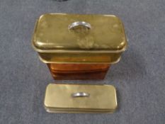 An antique copper and brass lidded container together with a further brass lidded container