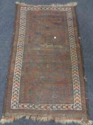 An antique Afghan rug,