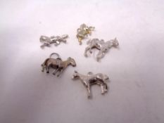 A small quantity of silver charms