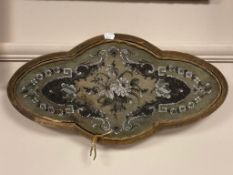 A Victorian beaded shaped stand (currently hanging), width 54 cm.