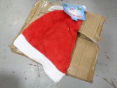 A box containing a quantity of Christmas hats