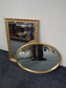 A gilt framed bevel edged mirror together with a further oval framed bevel edged mirror