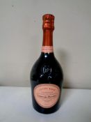 A bottle of Laurent Perrier Rose Champagne