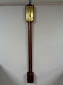 An antique stick barometer