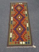 A Maimana kilim runner, 147cm by 59cm.