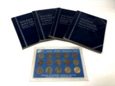 Four British coin folders (partially complete) and a brass threepence collection 1967.