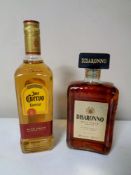 A bottle of Jose Cuervo Tequila, 70cl, together with a bottle of Disaronno,