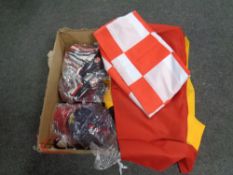 A box containing a large quantity of novelty underwear, T-shirts, flags,