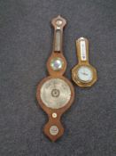 An Edwardian banjo barometer together with a further oak barometer (as found)