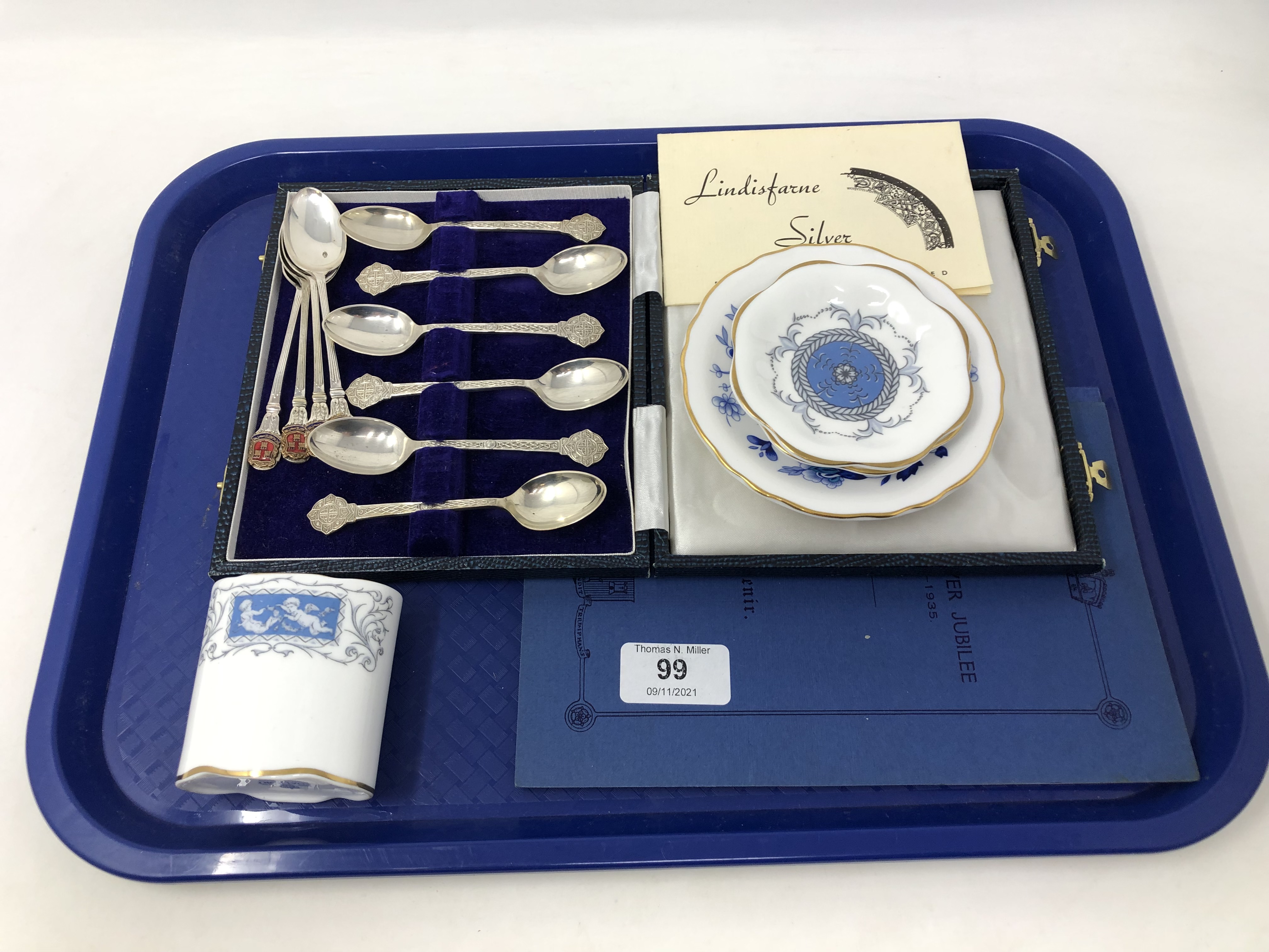 A boxed set of six Lindisfarne silver teaspoons by Reid & Sons,