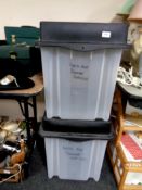 Two large plastic storage boxes with lids