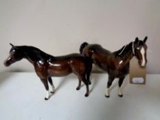 Two Royal Doulton horses (brown)