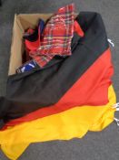 A box containing a large quantity of novelty underwear, T-shirts, flags,