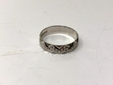 A 9ct white gold band ring, size Q.