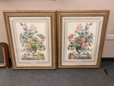 A pair of colour prints in contemporary frames depicting flowers in urns, 90 cm x 71 cm.