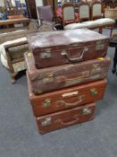 Four 20th century luggage cases