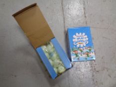 A box containing a quantity of Christmas splat snowballs