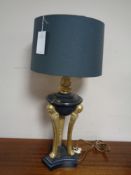 A metal and brass Art Deco style table lamp with shade