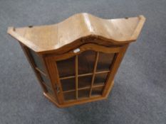 An oak wall cabinet