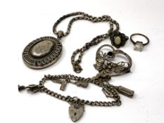 A late Victorian silver locket on belcher-link chain, together with a charm bracelet, brooch,