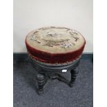 A Victorian ebonised stool