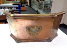 A Victorian brass and copper fire front