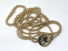 A vintage Art Deco style four stranded faux pearl necklace