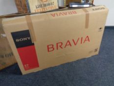 A boxed Sony Bravia 37 inch LCD TV