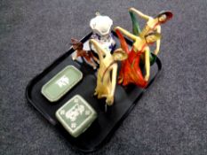A tray of three early 20th century Wade Art Deco female figures, two pieces of Wedgwood,