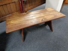 A stained beech refectory coffee table