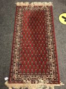 A machine made eastern rug,