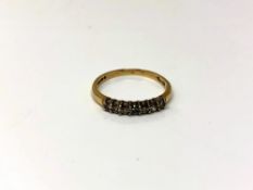 A 9ct gold diamond half eternity ring, 1.