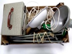 A box of photographic equipment, angle poised lamps,
