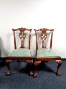 A pair of contemporary Chippendale style dining chairs on claw and ball feet