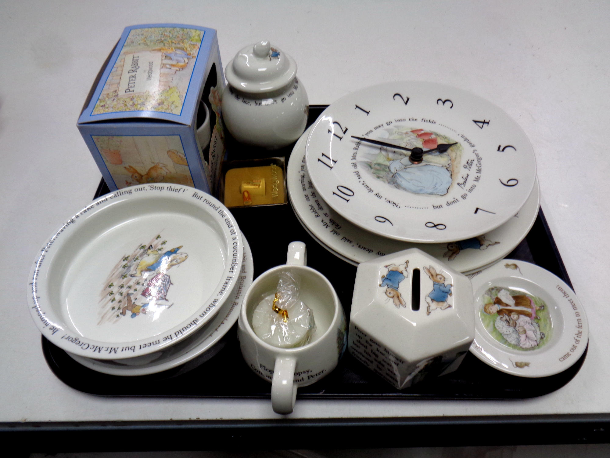 A tray of fifteen pieces of Wedgwood Beatrix Potter nursery china