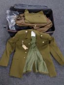 A suitcase of military tunics and jackets